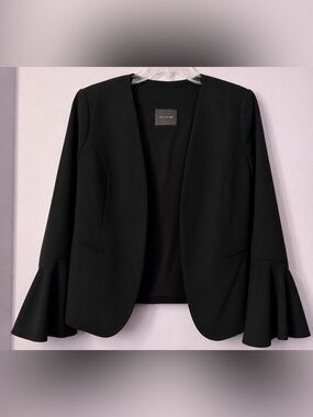 The limited black blazer with bell sleeves